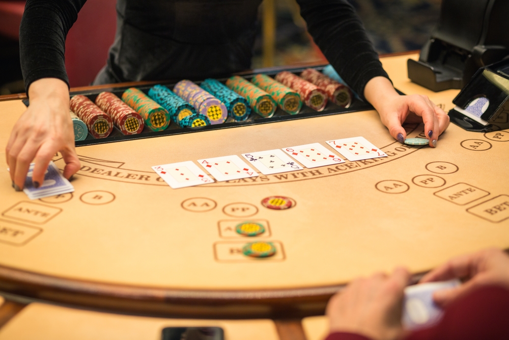 Blackjack,Dealer,Handing,Cards,-,Casino,Table,Game,In,Action