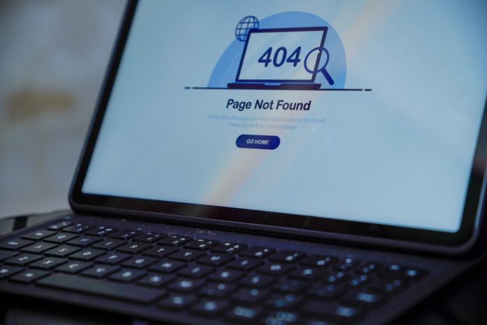 The,Display,On,The,Laptop,Screen,Shows,The,Message,404